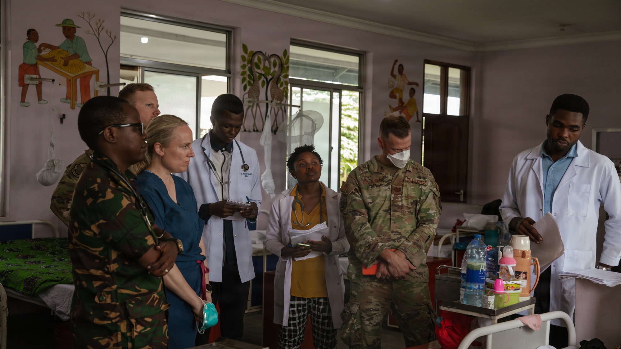 African doctor with patient