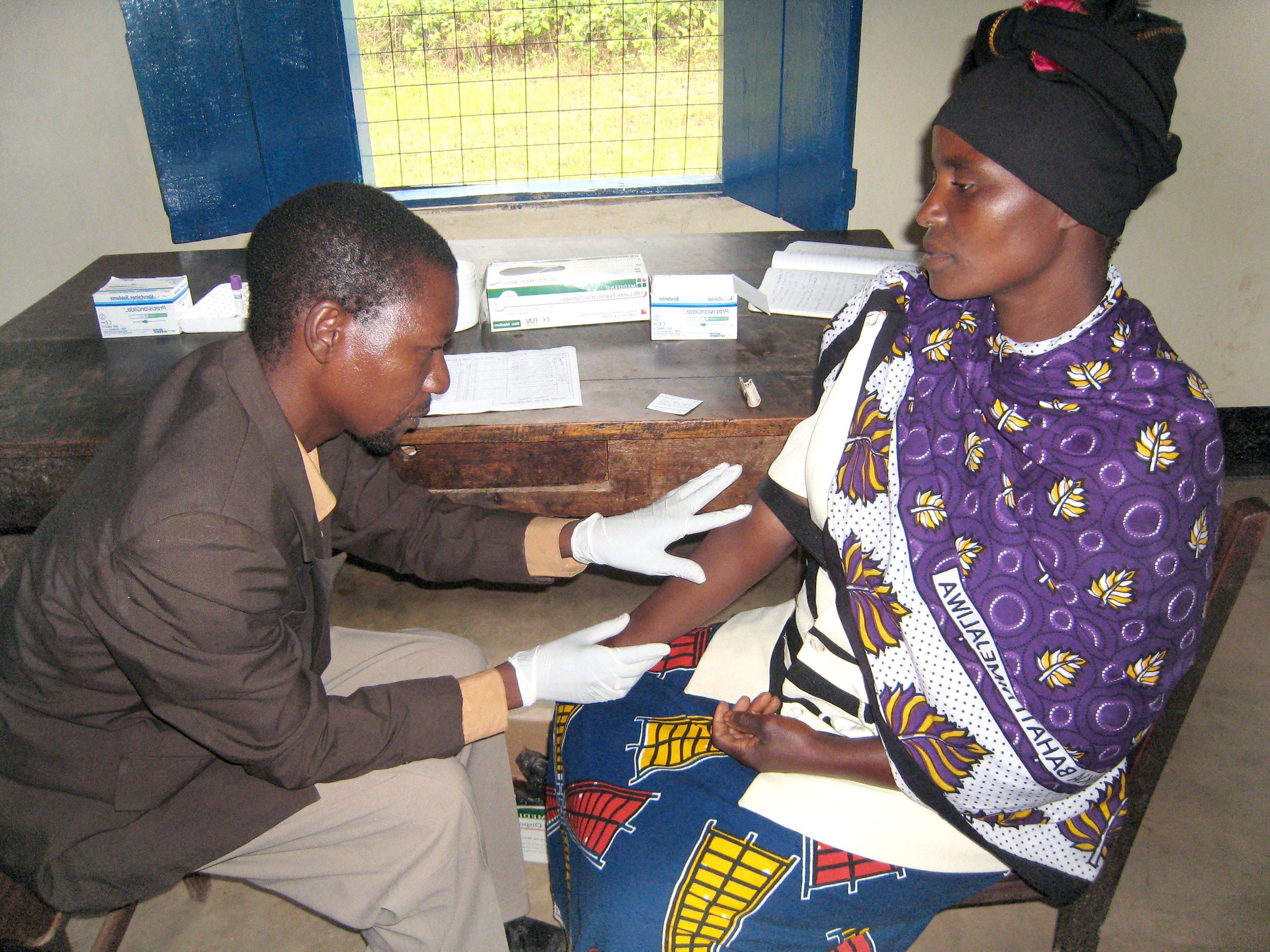 Doctor consulting patient